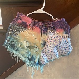 Distressed studded high-waisted shorts